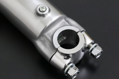 Close-up of a metallic mechanical component on a dark background