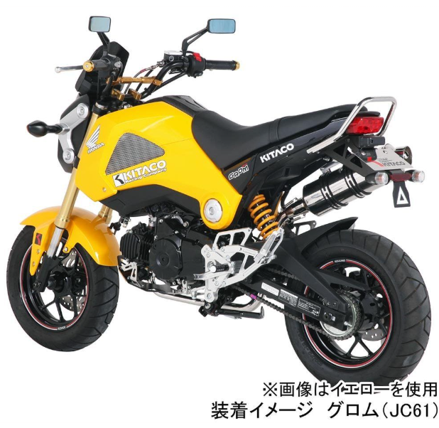Yellow motorcycle with Kitaco branding on a white background