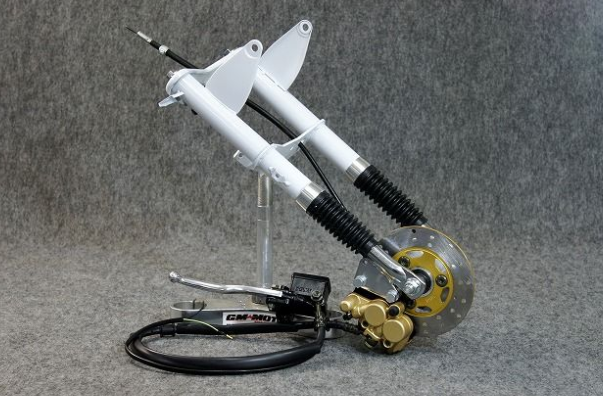 Close-up of a suspension system on a gray background
