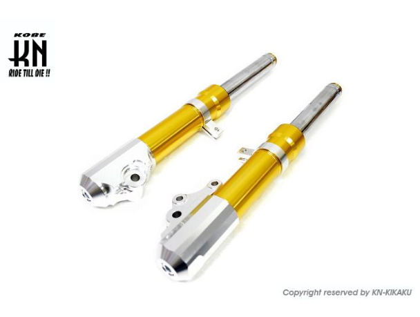 Two yellow motorcycle shock absorbers on a white background with K&N logo.