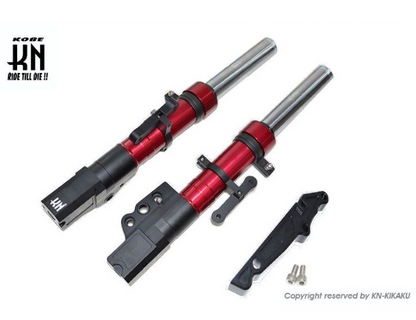 Red and black motorcycle shock absorbers with Kikaku branding on a white background