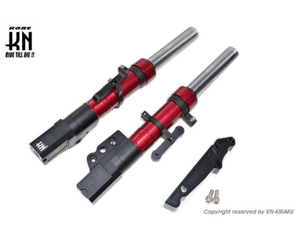 Red and black motorcycle shock absorbers with Kikaku branding on a white background