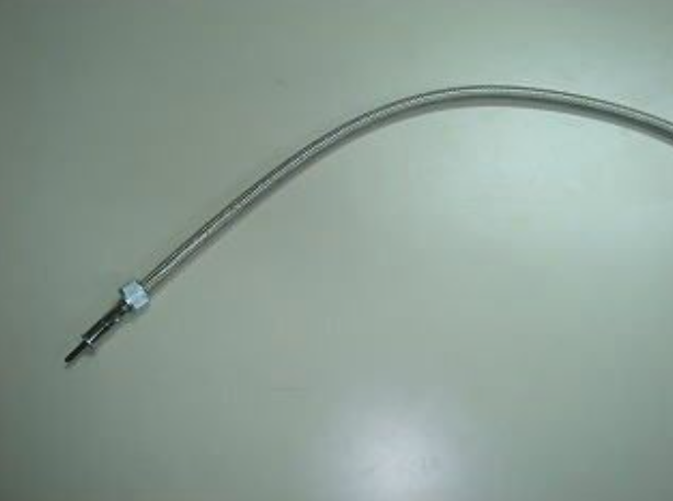 Metal cable or wire on a plain background