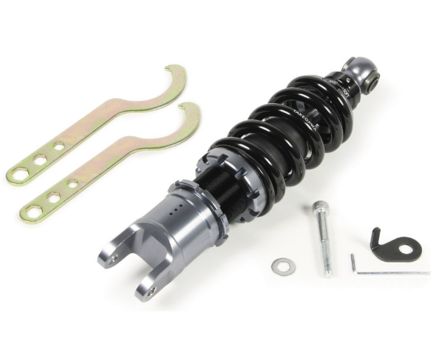 Motorcycle shock absorber with hardware on a white background