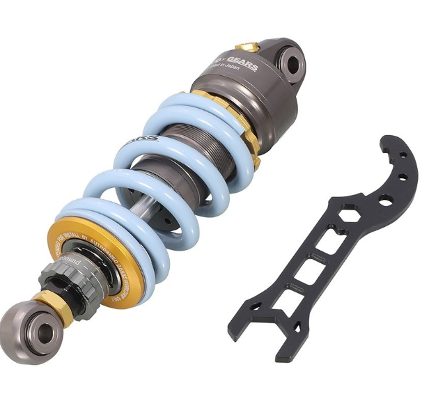 Shock absorber with a tool on a white background