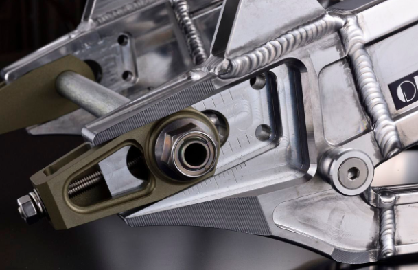 Close-up of a mechanical component with gears and metal parts.