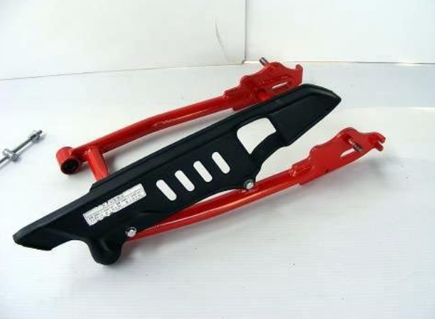 Black car bumper with red clips on a white background