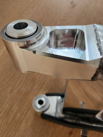 Metallic component on a wooden surface