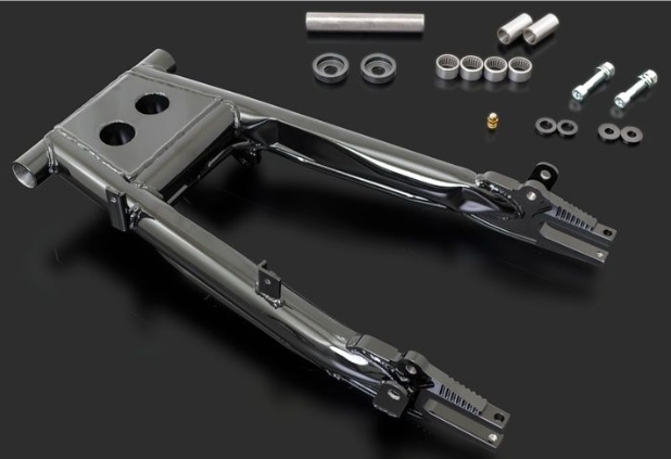 Metallic mechanical component with smaller parts on a dark background
