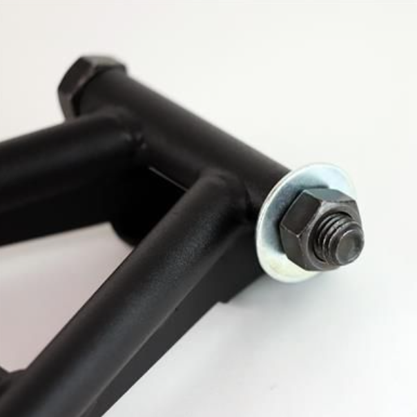 Close-up of a black metal frame with a bolt on a white background