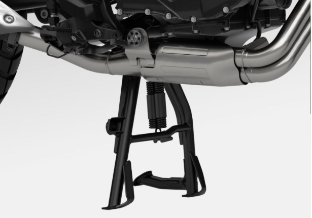 Close-up of a motorcycle exhaust system on a white background