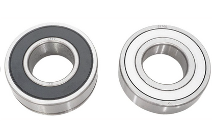 Two metal bearings on a white background