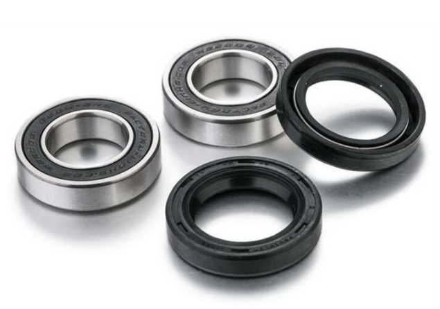 Four mechanical bearings on a white background