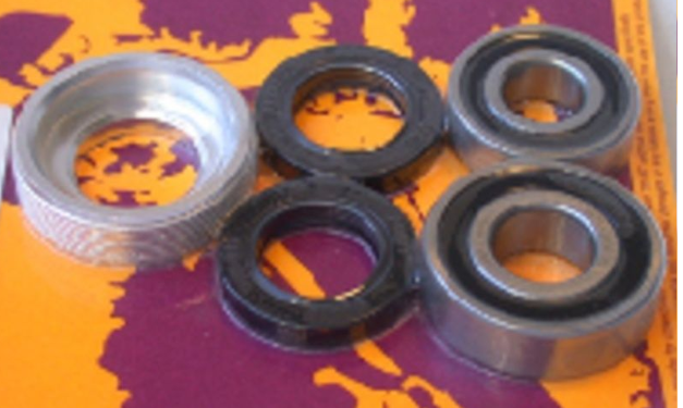 Four metal bearings on a colorful background