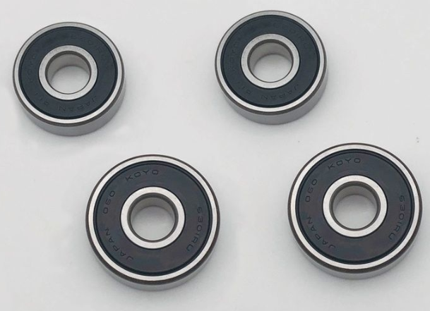 Four bearings with 'Yokohama' branding on a white background