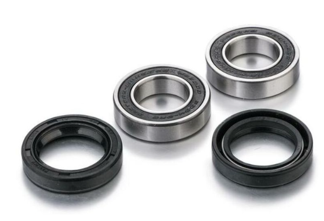 Four mechanical bearings on a white background