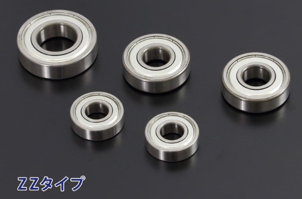 Five metal bearings of different sizes on a black background with 'ZZ type' text.