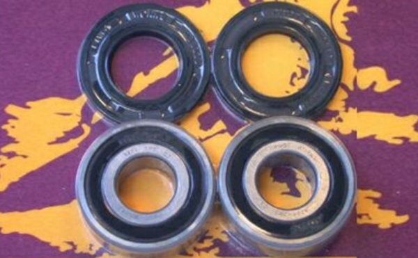 Four bearings on a purple and yellow background