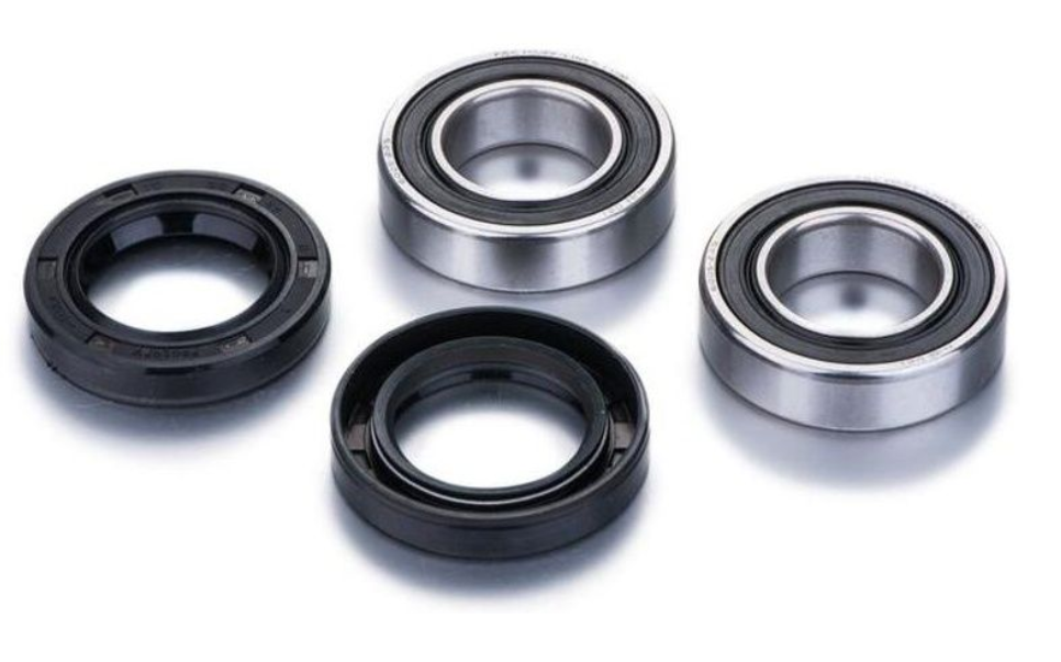 Four mechanical bearings on a white background