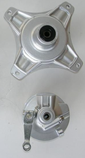 Two metallic mechanical components on a white background