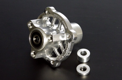 Metallic hub with two washers on a black background
