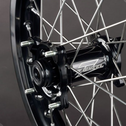 Close-up of a motorcycle wheel with 'Z-Wheel' branding on a dark background