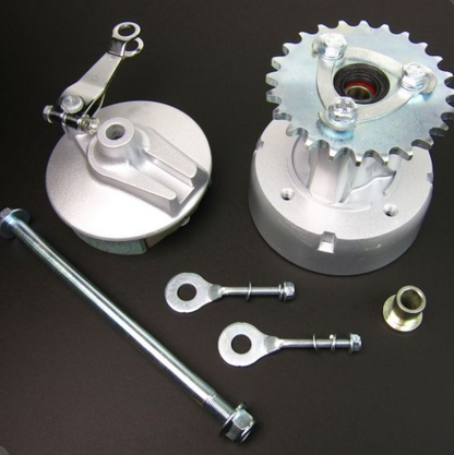 Mechanical components including gears and bolts on a dark background