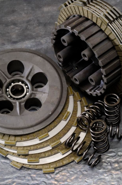Clutch plates and springs on a textured surface