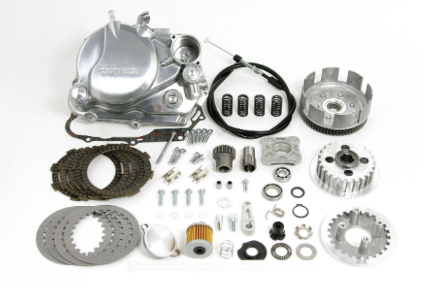 Collection of motorcycle engine parts on a white background