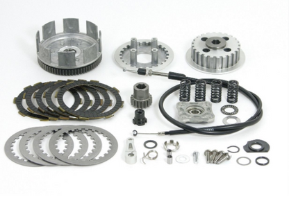 Mechanical parts including gears, springs, and bearings on a white background