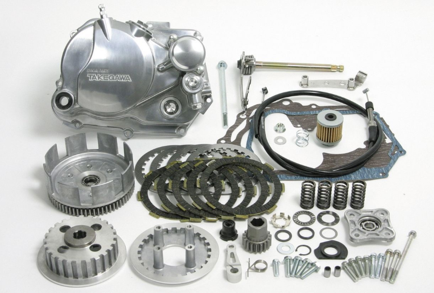 Motorcycle engine parts set on a white background