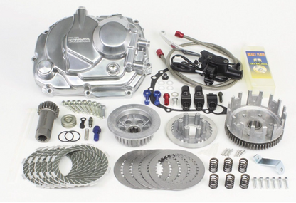 Automotive engine parts kit on a white background