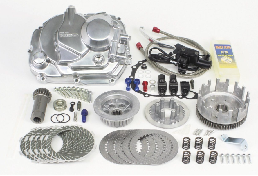 Automotive engine parts kit on a white background