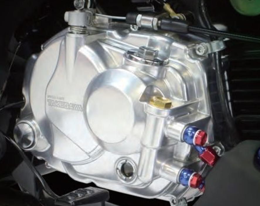 Close-up of a motorcycle engine with visible branding