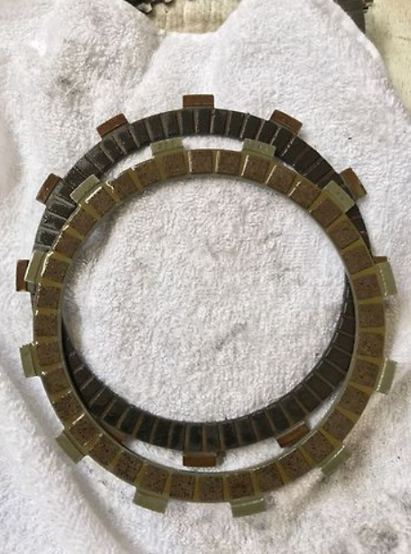 Clutch plate on a white towel