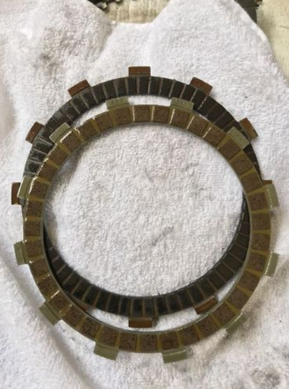 Clutch plate on a white towel