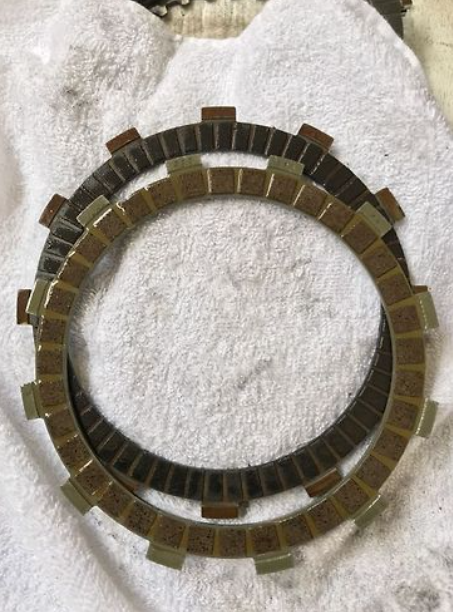 Clutch plate on a white towel