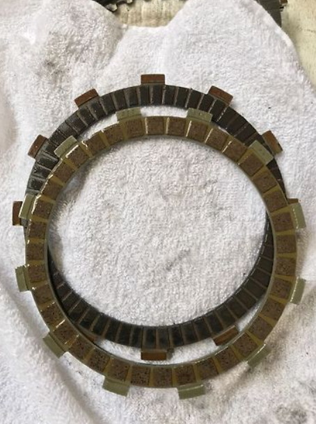 Clutch plate on a white towel