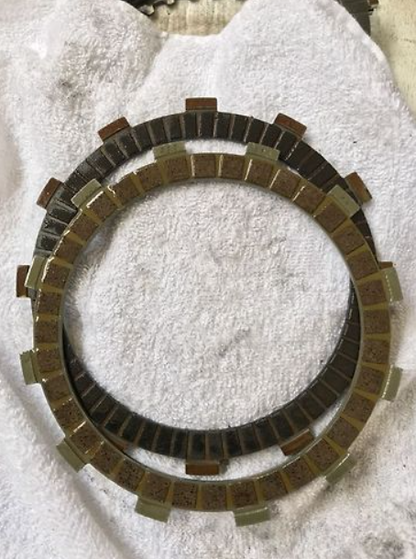 Clutch plate on a white towel