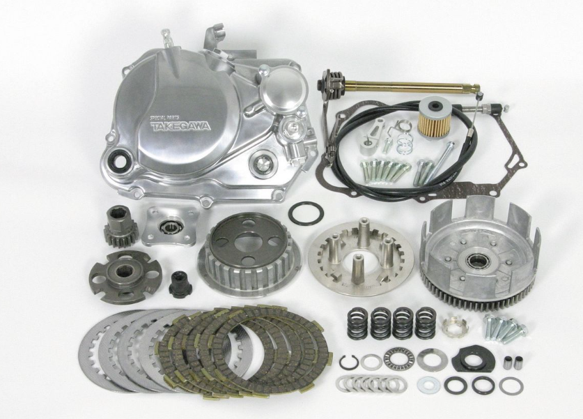Motorcycle engine parts on a white background