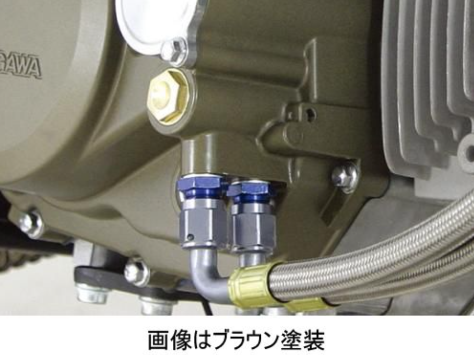 Close-up of mechanical components with hoses and connectors on a brown background