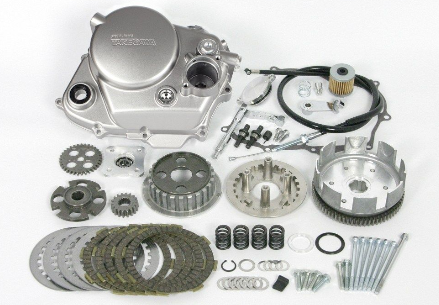 Motorcycle engine parts on a white background