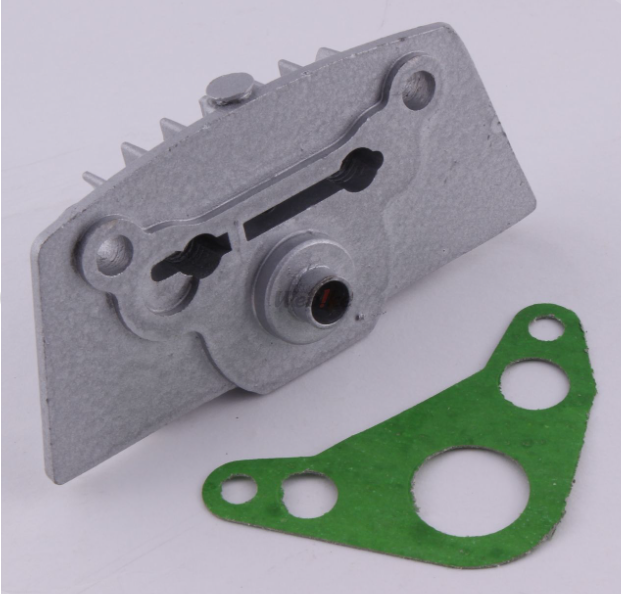 Mechanical component with spiky edge and green gasket on a white background