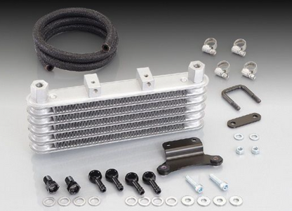 Oil cooler kit with various components on a gray background