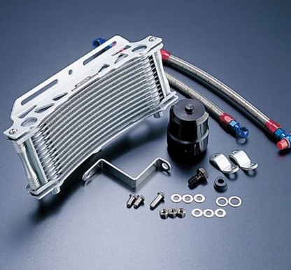 Oil cooler kit with hoses and accessories on a gray background