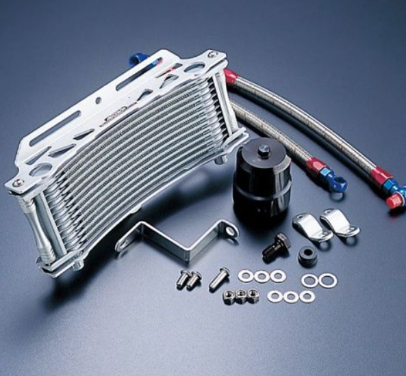 Oil cooler kit with hoses and accessories on a gray background