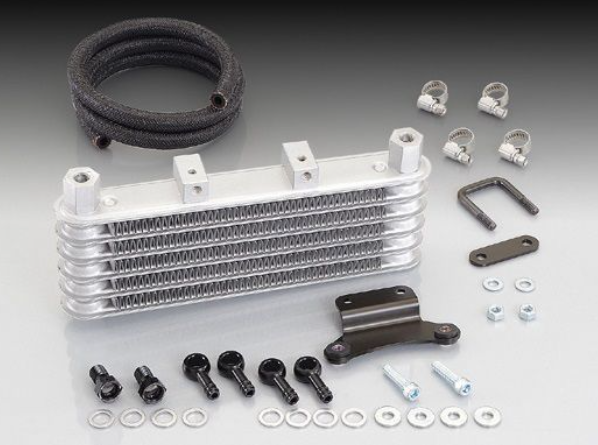 Oil cooler kit with various components on a gray background