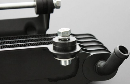 Close-up of a mechanical component with a bolt on a gray background