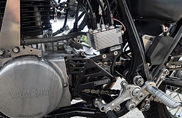 Close-up of a Yamaha motorcycle engine with visible branding.