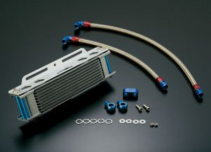 Oil cooler kit with hoses and connectors on a dark background